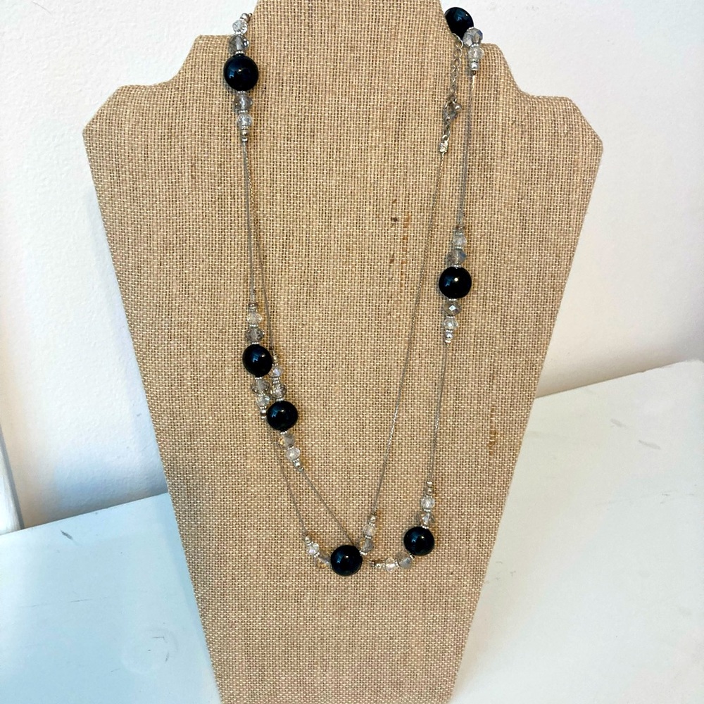 Long statement necklace. Black silver and clear beads. Adjustable length